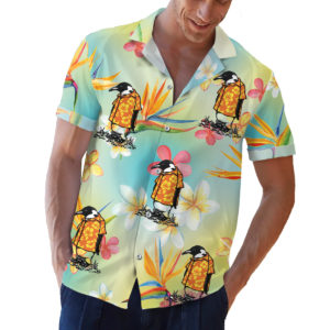 Penguin wearing an orange hawaiian shirt button up shirt