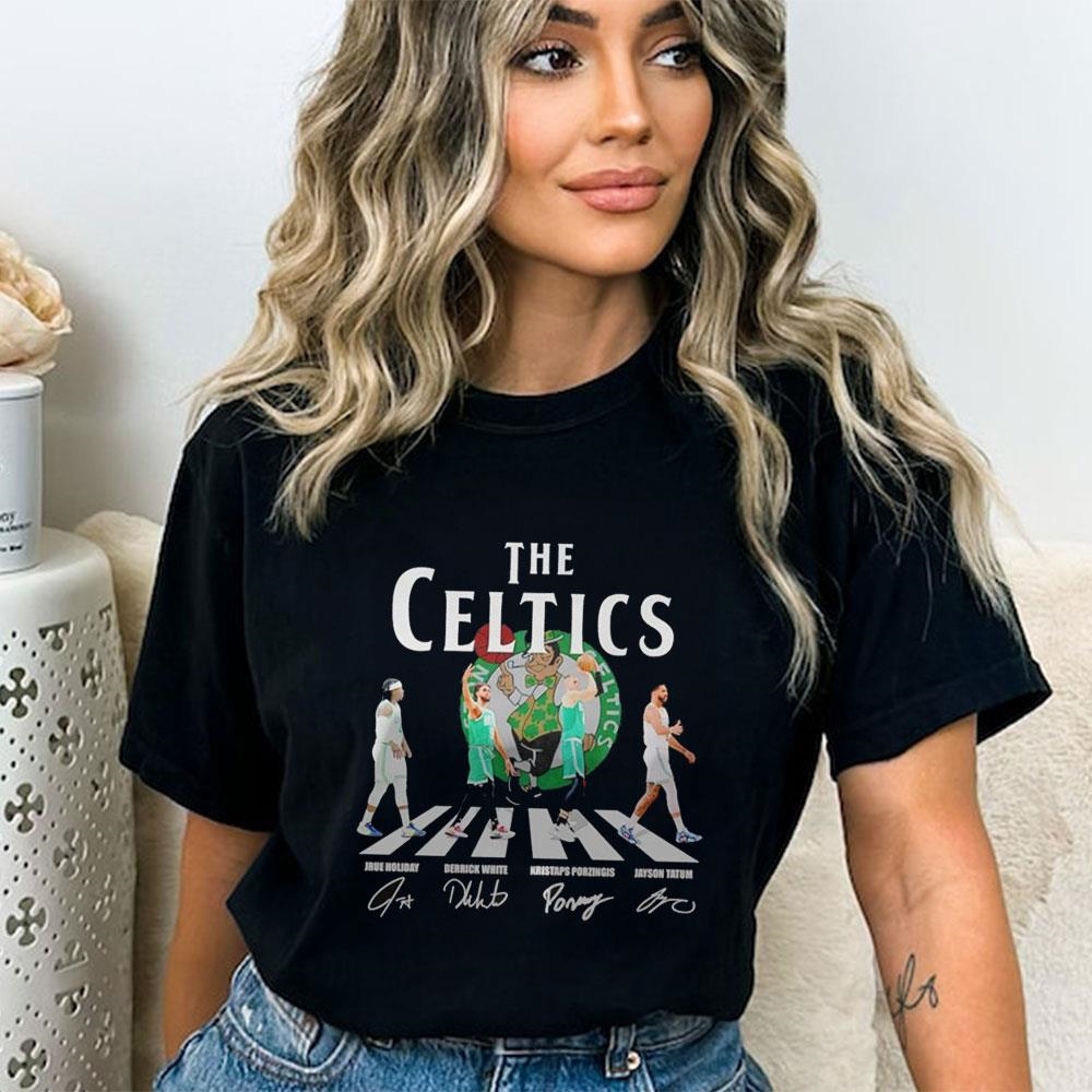 The Boston Celtics Holiday White Porzingis And Tatum Walking Across Signatures Shirt Hoodie The Boston Celtics Holiday White Porzingis And Tatum Walking Across Signatures Shirt Hoodie