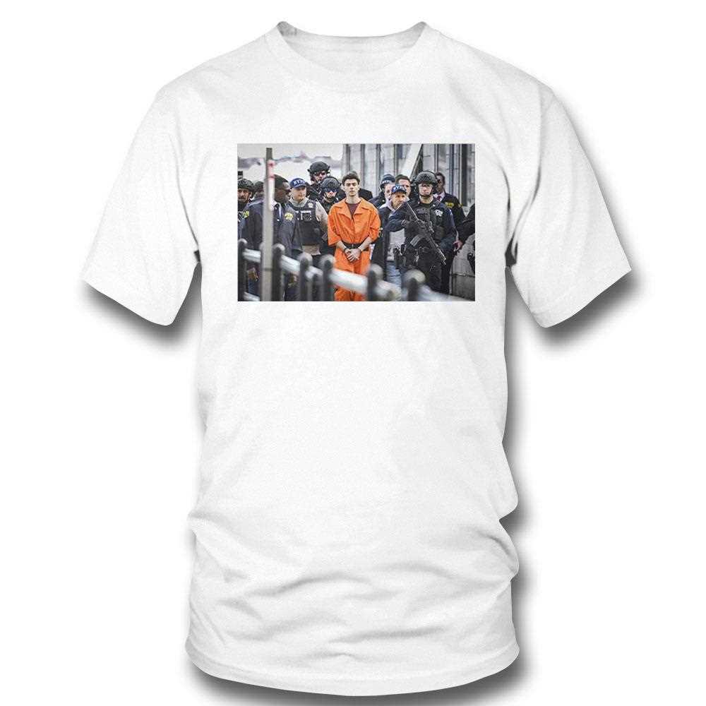 Luigi Mangione Arrives At A Helicopter Pad With Police New York Shirt