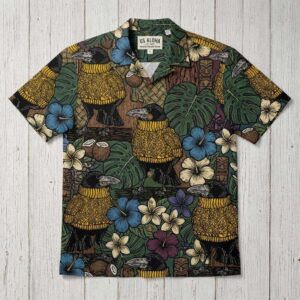 Bejumpered Raven wearing a mustard yellow jumper Hawaiin Shirt, with quirky ravens, tropical leaves, and blue flowers.