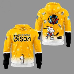 Bloomington Bison Peanuts Hoodie with a vibrant yellow design, Snoopy playing hockey, team logo, & snowflakes.