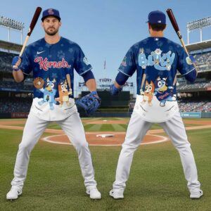 Cedar Rapids Kernels Bluey Night Jersey. Blue baseball jersey with Kernels logo, Bluey characters playing baseball, and paw prints.