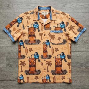 Chickadee and Tiki mug Hawaiin Shirt with blue chickadees in sunglasses on tiki mugs, palm trees, surfboards on an orange background.