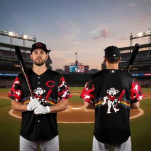 Cincinnati Reds Grateful Dead Night 2026 Baseball Jersey. Black jersey with red camo sleeves, Grateful Dead bear graphic, and Reds logo.
