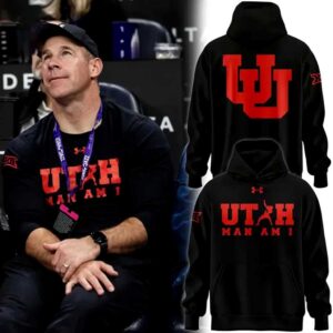 Coach Morgan Scalley Utah MAN AM I Hoodie. Black, red 'UTAH' (dunking 'A'), 'MAN AM I' print, large red Utes logo back.