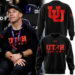 Coach Morgan Scalley Utah MAN AM I Hoodie. Black, red 'UTAH' (dunking 'A'), 'MAN AM I' print, large red Utes logo back.