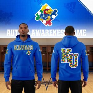 Kansas Jayhawks Autism Awareness Tee Hoodie, blue, with colorful puzzle piece 'KANSAS' front & 'KU' back logos, supporting autism.