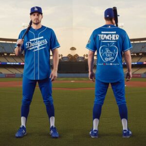 LA Dodgers Teacher Appreciation Day 2026 Special Jersey. Blue, 'Dodgers' front. Back: 'TEACHER', apple with LA heart-rate logo, 'teach love inspire'.