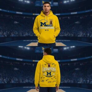 Michigan Wolverines NCAA Basketball Champions 2026 Hoodie. Yellow fan hoodie featuring team 'M' logo, 'CHAMPIONS' text, and player signatures on the back.