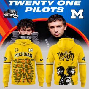 Michigan Wolverines Twenty One Pilots 2026 NCAA March Madness Music Festival Hoodie: yellow, skeleton ribcage, band text, and TØP portraits.
