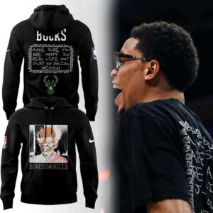 Milwaukee Bucks An Important Reminder Tee Hoodie, black, with 'HAPPY IN REAL LIFE' social media message on back and 'BOREDOM KILLS' graphic on front.