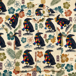 Multicoloured Crow Hawaiin T-Shirt with black crows in rainbow scarves on a tropical beige pattern with flowers, leaves, tiki masks.