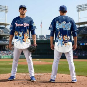 New Hampshire Fisher Cats Bluey Night Jersey. Blue baseball jersey featuring Bluey characters playing baseball on front and 'Bluey' on back.