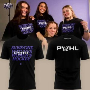 PWHL Everyone Watches Women's Hockey Hoodie. Man in black hoodie with purple 'Everyone Watches Women's Hockey' text on front, white 'PWHL' logo on back.