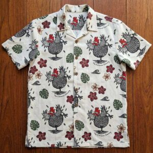 The Hentrancing Dancer Hawaiin Shirt featuring a fun all-over pattern of artistic hens with tropical flowers on a cream background.