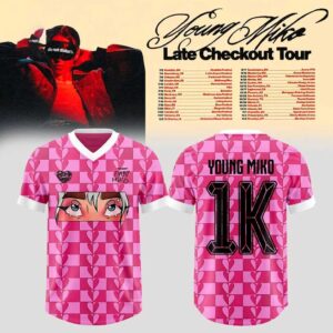 Young Miko Late Checkout Tour 2026 Football Jersey with pink checkerboard heart pattern, anime eyes on front, and 'Young Miko 1K' on back.