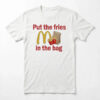 Matt Damon sorry John I dont remember Rounders shirt